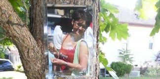 Outside of her Peterborough home, Gail Parry displays a photo of her late daughter Jody each August, the month she passed away from health issues related to her substance use. Parry is a member of Moms Stop The Harm, a network of Canadian families that advocates for change as that pertains to failed substance use strategies and policies, and is the key organizer of local events associated with International Overdose Awareness Day held annually on August 31. (Photo courtesy of Gail Parry)