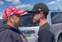 Hunter Jones's pregnant girlfriend took a video of a confrontation with an unidentified man (left) who threatened Jones and his girlfriend after they pulled into a parking spot for expecting mothers or parents with young children at Loblaw's Real Canadian Superstore in Peterborough on August 13, 2022. The man's minivan, which contained a gun in the glove box the man displayed to Jones. is pictured in the background. (Screenshot courtesy of Hunter Jones)