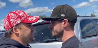 Hunter Jones's pregnant girlfriend took a video of a confrontation with an unidentified man (left) who threatened Jones and his girlfriend after they pulled into a parking spot for expecting mothers or parents with young children at Loblaw's Real Canadian Superstore in Peterborough on August 13, 2022. The man's minivan, which contained a gun in the glove box the man displayed to Jones. is pictured in the background. (Screenshot courtesy of Hunter Jones)