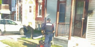 A Peterborough police officer, since identified as Constable Brandon Bigelow, recently cut the lawn of a 76-year-old resident who was upset about being unable to do so because of a medical procedure. (Photo via Peterborough Police Service / Facebook)