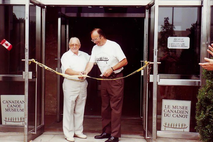 Les Groombridge and Dr. Don Curtis cut the ribbon during the official opening of The Canadian Canoe Museum's Monaghan Road location in 1997. (Photo courtesy of The Canadian Canoe Museum)