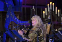 During her "Under A Winter's Moon" tour, Loreena McKennitt will sing and play harp, keyboard, and accordion, accompanied by musicians Caroline Lavelle, Graham Hargrove, Errol Fischer, Pete Watson, and Cait Watson. The concert will also feature readings by Tom Jackson (pre-recorded), Cedric Smith, and Jeffrey "Red" George. (Photo via Under A Winter's Moon website)