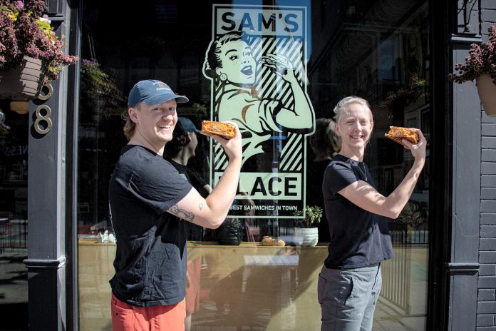 Eddy Sweeney and Sam Sayer  of Sam's Place Deli with their Mac and Cheese Loafwich. (Photo courtesy of Peterborough DBIA)