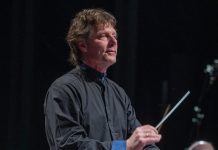 Maestro Michael Newnham conducting the Peterborough Symphony Orchestra at the "Christmas Fantasia' concert in December 2019 before the pandemic. The popular "Meet the Maestro" pre-concert talks are returning for 2022-23, the orchestra's first full season since the pandemic began. (Photo: Huw Morgan)