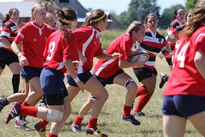 Rowan Stringer with the ball during a 2013 rugby game. Two years after her death, an inquest was held in Ottawa about the fatal injury she suffered during a game and, in 2018, the Ontario legislature passed Rowan's Law with mandatory requirements for sports organizations for concussion management and prevention. (Photo: Stringer family)