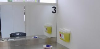 One of the three consumption booths at the Consumption and Treatment Services site (CTS), located at the Opioid Response Hub at 220 Simcoe Street in downtown Peterborough. Each booth has a mirror so the on-site paramedic can observe people as they prepare and consume their substances. (Photo: Bruce Head / kawarthaNOW)