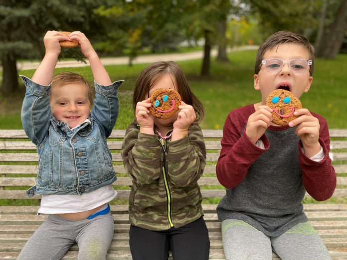 Since 1996, the annual Tim Hortons Smile Cookie campaign has raised more than $75 million for thousands of local charities and community groups. (Photo: Tim Hortons)