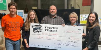 Twisted Trauma Foundation co-founder Jon Perrin (middle) with Colton Eddy, Melissa Carroll, Amy Terrill, and Carly Veitch of BGC Kawarthas. (Photo courtesy of BGC Kawarthas)