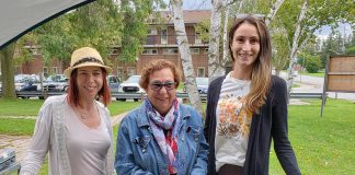 Penny Barton Dyke (middle), Shantal Ingram (left), and Emily Beall (right) at the Edwin Binney's Community Garden Farm Stand at 50 Mary Street West in Lindsay. Barton Dyke is retiring as executive director of United Way for the City of Kawartha Lakes after more than 17 years in the position. Ingram and Beall are the organization's new co-executive directors. (Photo courtesy of United Way for the City of Kawartha Lakes).