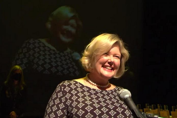 Alicia Doris accepts the Local Focus award for her business Living Local Marketplace, which showcases and shares the work of local artisans and small businesses. (kawarthaNOW screenshot)