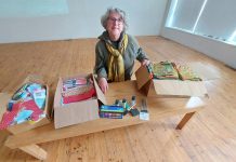Community member Sue displays some of the art and craft supplies recently donated to Artspace Peterborough for its new maker space, scheduled to open in early 2023. (Photo: Artspace Peterborough / Facebook)