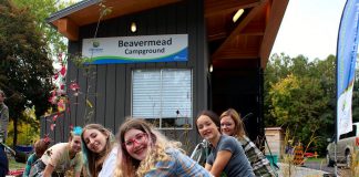 Some of the students in the Kawartha Pine Ridge District School Board's Youth Leadership in Sustainability Program who helped install a rain garden at Beavermead Campbround's new gatehouse in Peterborough. (Photo courtesy of Otonabee Conservation)