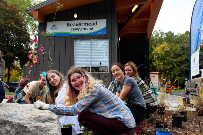 Some of the students in the Kawartha Pine Ridge District School Board's Youth Leadership in Sustainability Program who helped install a rain garden at Beavermead Campbround's new gatehouse in Peterborough. (Photo courtesy of Otonabee Conservation)