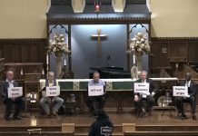 Peterborough mayoral candidates listen to a question from an audience member during a debate on October 5, 2022 hosted by the United Way of Peterborough & District at All Saints' Anglican Church. (kawarthaNOW screenshot)