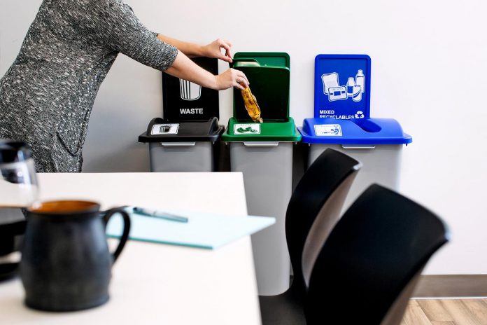 An example of a commercial waste system designed to maximize waste diversion. Colour-coded bins, restrictive openings, bins placed close together, and clear signage are all identified as key opportunities to increase stream separation, resulting in less material headed to landfill. (Photo courtesy of Busch Systems)