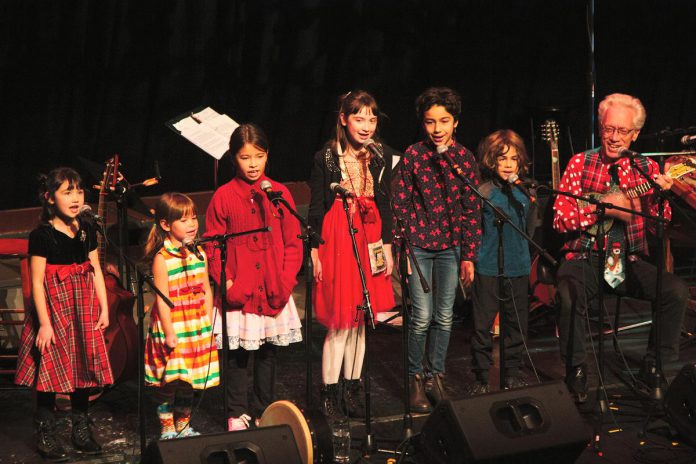 Curtis Driedger (right) performing at the 2019 In From The Cold concert as his longtime onstage persona Enrique 'Roy' Claveer, with his light-hearted portion of the concert featuring young talent. (Photo: Alnis Dickson)