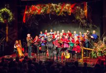 Carried Away and the Convivio Chorus perform at the 2015 In From The Cold concert at Market Hall Performing Arts Centre in downtown Peterborough. The 23rd annual concert, which has raised more than $150,000 to date for Peterborough's YES Shelter for Youth and Families, is returning in-person to the Market Hall on December 9 and 10, 2022 after two years of virtual concerts due to the pandemic. (Photo: Linda McIlwain / kawarthaNOW)