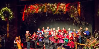 Carried Away and the Convivio Chorus perform at the 2015 In From The Cold concert at Market Hall Performing Arts Centre in downtown Peterborough. The 23rd annual concert, which has raised more than $150,000 to date for Peterborough's YES Shelter for Youth and Families, is returning in-person to the Market Hall on December 9 and 10, 2022 after two years of virtual concerts due to the pandemic. (Photo: Linda McIlwain / kawarthaNOW)