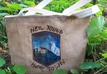 Volunteers with Creating Space Community Arts Studio in Peterborough have stitched and embroidered four fully lined bags using recycled burlap from the stage of Neil Young's December 2017 "Home Town" concert at Omemee's Corontation Hall. The bags, which also feature the image from the stage backdrop, will be auctioned off on November 4 and 5, 2022 to raise funds for the non-profit organization's local arts initiative. (Photo: Creating Space / Instagram)