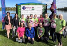 On October 4, 2022, volunteers from the Survivors Abreast Dragon Boat Team and the Peterborough's Dragon Boat Festival organizing committee presented the Peterborough Regional Health Centre Foundation with a cheque for $202,268.41. Pictured among the volunteers are PRHC Foundation president and CEO Lesley Heighway and festival platinum sponsor Kawartha Credit Union's president and CEO Norah McCarthy (back row, left) and festival chair and Survivors Abreast member Michelle Thornton and top fundraiser Rhonda Barnet (kneeling, left). (Photo courtesy of Peterborough's Dragon Boat Festival)