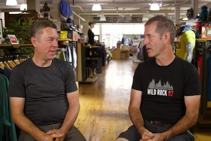 Kieran Andrews and Scott Murison are celebrating 30 years since they founded Wild Rock Outfitters in downtown Peterborough. Looking to the future, the pair are gradually scaling back their ownership stake and involvement in the business, with general manager Tori Silvera and aerobic sports department manager Jeff Faulds becoming majority owners. (Screenshot of 30th anniversary video produced by Birchbark Media)