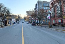Hunter Street East facing Rogers Street in Peterborough's East City on November 4, 2022, showing Ashburnham Realty's new commercial and residential development beside the Rotary Greenway Trail nearing completion. (Photo: Bruce Head / kawarthaNOW)