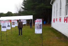 Some of the 40 flags depicting individuals associated with Irondale who served Canada in various aspects of war on display on the grounds of the historic Irondale Church in Minden Hills during "Service, Courage & Sacrifice" from November 5 to 13, 2022. (Photo: Bark Lake Cultural Developments / Facebook)