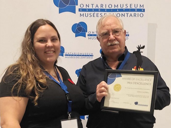 Lang Pioneer Village Museum volunteer John Caldwell with his Volunteer Service Award of Excellence from the Ontario Museum Association on November 7, 2022. (Photo: Lang Pioneer Village Museum / Facebook)