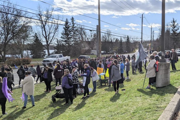 CUPE education workers and supporters protesting in front of Peterborough-Kawartha MPP Dave Smith's constituency office on Water Street in Peterborough on November 7, 2022. (Photo: Bruce Head / kawarthaNOW)