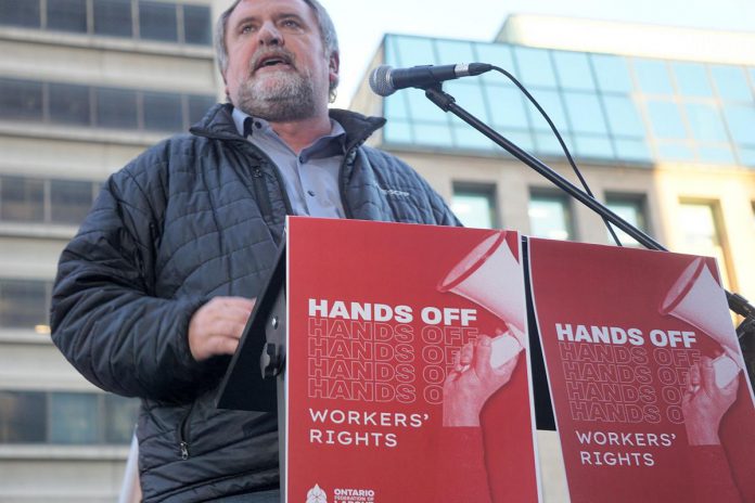 CUPE national president Mark Hancock speaking at a rally in downtown Toronto on November 1, 2022 organized by the Ontario Federation of Labour in response to the Ontario governemnt's "Keeping Students in Schools Act" which would impose a four-year contract on CUPE education workers and ban a strike. (Photo: CUPE Ontario / Facebook)