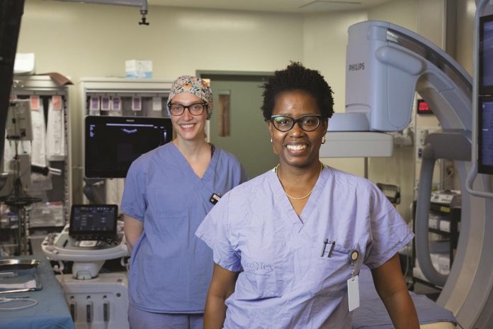 Interventional radiologist Dr. Kebby King (right) and registered technologist Saara King at Peterborough Regional Health Centre (PRHC). Dr. King and her colleagues perform 6,000 interventional radiology procedures a year for patients like Stuart Morley from across the region. To meet the growing need for this service, PRHC's facilities must be upgraded with a $6 million investment. (Photo courtesy of PRHC Foundation)