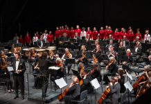 A holiday tradition returns to Showplace Performance Centre when the Peterborough Symphony Orchestra presents "A Holiday Welcome" featuring special musical guest James Westman on December 10, 2022. Pictured is the orchestra with guest artists Bradley Christensen and the Toronto Children's Chorus at its last holiday concert before the pandemic, "Christmas Fantasia" in December 2019. (Photo: Huw Morgan)