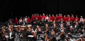 A holiday tradition returns to Showplace Performance Centre when the Peterborough Symphony Orchestra presents "A Holiday Welcome" featuring special musical guest James Westman on December 10, 2022. Pictured is the orchestra with guest artists Bradley Christensen and the Toronto Children's Chorus at its last holiday concert before the pandemic, "Christmas Fantasia" in December 2019. (Photo: Huw Morgan)