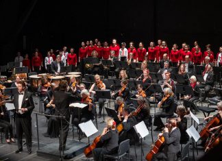 A holiday tradition returns to Showplace Performance Centre when the Peterborough Symphony Orchestra presents "A Holiday Welcome" featuring special musical guest James Westman on December 10, 2022. Pictured is the orchestra with guest artists Bradley Christensen and the Toronto Children's Chorus at its last holiday concert before the pandemic, "Christmas Fantasia" in December 2019. (Photo: Huw Morgan)