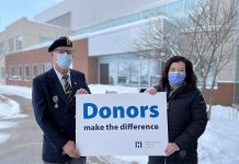 Bobcaygeon Legion president Gary Whelan and Ross Memorial Hospital Foundation CEO Erin Coons at Ross Memorial Hospital in Lindsay on December 19, 2022, where Whelan presented a gift of $5,000. (Photo courtesy of Ross Memorial Hospital Foundation)