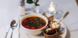 Operated by Ukrainian refugee families, Cafe Lviv at 90 Mill Street North in downtown Port Hope serves authentic Ukrainian cuisine including borscht (pictured), nalysnyky, kanapky, Chicken Kyiv, deruny, varenyky, holubtsi, and more. (Photo: Mira Knott / Knott Studio)
