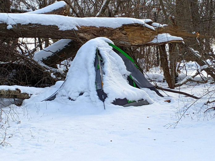 A snow-covered tent in a park in Peterborough, Ontario on December 19, 2022. (Photo: Bruce Head / kawarthaNOW)