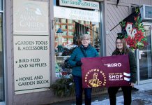 Karen Scott (left) celebrates her win of a $500 Boro gift card as well as a Peterborough Musicfest Diner's Book with Avant-Garden Shop customer service representative Marissa Dunk. Scott won the second early bird draw of the Peterborough Downtown Business Improvement Area (DBIA) annual Holiday Shopping Passport program. She completed her winning passport at the Avant-Garden Shop at 165 Sherbrooke Street in downtown Peterborough, where she purchased some Christmas presents for her family and garden supplies. (Photo courtesy of Peterborough DBIA)
