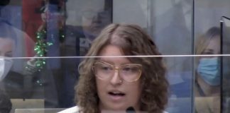 Peterborough Police Service community engagement and development coordinator Emily Jones addressing Peterborough City Council on December 12, 2022 about the plans of a coalition of community agencies including the police service to operate a drop-in centre for homeless people during the winter. City council has voted twice against a motion to provide $100,000 funding for the drop-in centre. (kawarthaNOW screenshot)