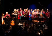 Rob Fortin, Susan Newman, John Hoffman, and Michael Ketemer with the Convivio Chorus performing at the 23rd annual In From The Cold concert, held on December 9 and 10, 2022. (Photo: YES Shelter for Youth and Families / Facebook)