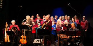 Rob Fortin, Susan Newman, John Hoffman, and Michael Ketemer with the Convivio Chorus performing at the 23rd annual In From The Cold concert, held on December 9 and 10, 2022. (Photo: YES Shelter for Youth and Families / Facebook)