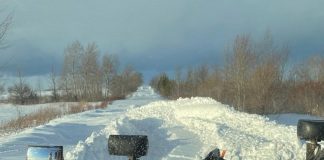 A snow plow truck works to clear a rural road in the City of Kawartha Lakes following the December 2022 winter storm. (Photo: City of Kawartha Lakes)