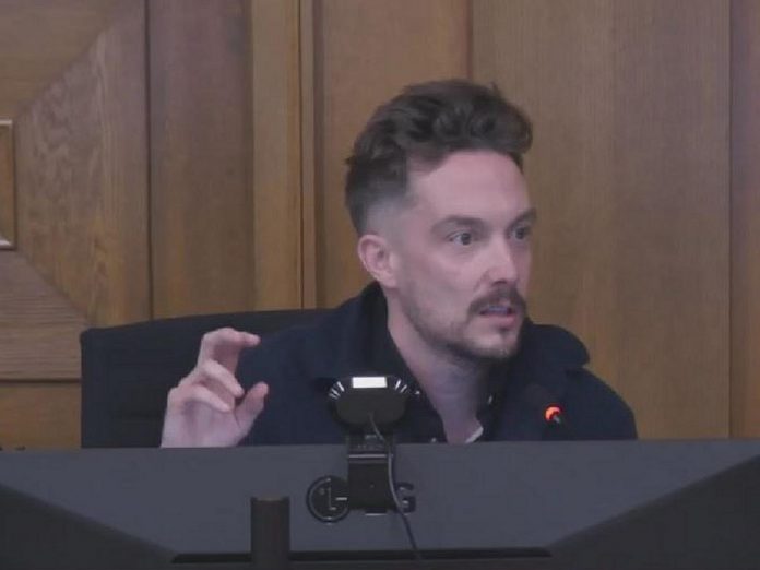 Town Ward councillor Alex Bierk speaks in support of one of his two motions to address the city's homelessness crisis at the inaugural general committee meeting of Peterborough's new city council on December 5, 2022. (kawarthaNOW screenshot of City of Peterborough livestream)