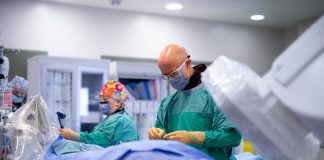 Dr. Warren Ball, interventional cardiologist and head of the cardiology division at Peterborough Regional Health Centre (PRHC), and members of the cardiac catheterization laboratory team provide a mock demonstration of the newly replaced and upgraded suites. Donors to the PRHC Foundation invested $3.55 million in the initiative to help "keep our hearts here" by ensuring life-saving cardiac care can remain available close to home. (Photo: Michael Hurcomb)