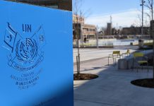 The UN Peacekeeping Monument at the entrance to Quaker Foods City Square on Charlotte Street in downtown Peterborough, with the outdoor skating rink pictured in the background. A community celebration and ribbon-cutting ceremony for the new public space, located just east of Aylmer Street, takes place on December 17, 2022. (Photo: Bruce Head / kawarthaNOW)