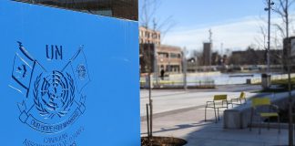The UN Peacekeeping Monument at the entrance to Quaker Foods City Square on Charlotte Street in downtown Peterborough, with the outdoor skating rink pictured in the background. A community celebration and ribbon-cutting ceremony for the new public space, located just east of Aylmer Street, takes place on December 17, 2022. (Photo: Bruce Head / kawarthaNOW)
