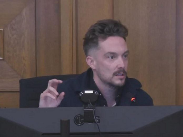 Town Ward councillor Alex Bierk speaks in support of one of his two motions to address the city's homelessness crisis at the inaugural general committee meeting of Peterborough's new city council on December 5, 2022. (kawarthaNOW screenshot of City of Peterborough livestream) 