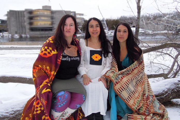 Beautiful Canoe Collective members Mapu Graner, Kerry Bebee, and Urpi Pine will perform their play "Journey the Canoe" at Nozhem First Peoples Performance Space at Trent University on January 27 and 28, 2003. The 45-minute play reclaims traditional Indigenous birthing practices and explores the performers' own birth stories. (Photo courtesy of the Beautiful Canoe Collective)