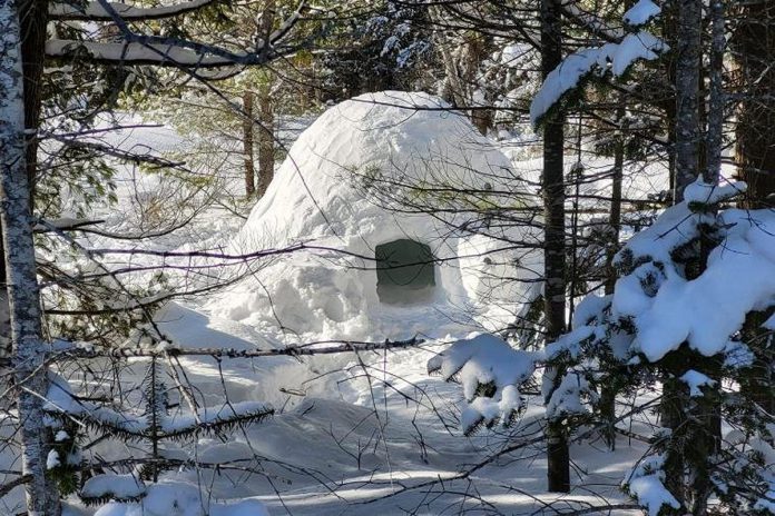 Paid adventure experiences during the Hike Haliburton Festival - Winter Edition on February 4 and 5, 2023 include "Intro to Igloo Building," where Yours Outdoors will teach you how to construct and camp in an igloo. (Photo courtesy of Yours Outdoors)