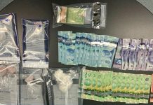 Illegal drugs and currency seized by Kawartha Lakes police after executing a search warrant at a Lindsay home on January 10, 2022. (Photo: Kawartha Lakes Police Service)